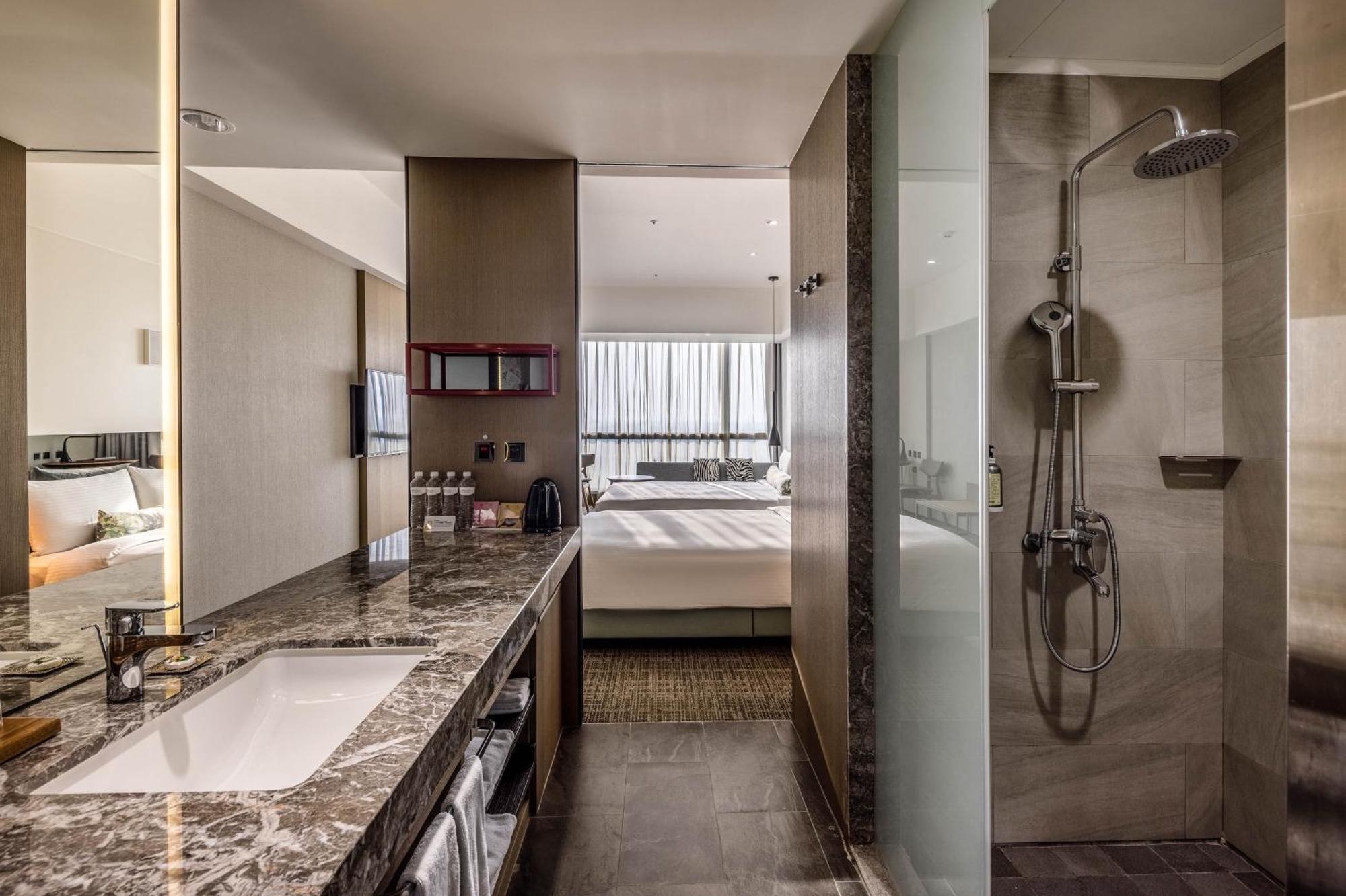 Hsin Hotel นครเจียอี้ ห้อง รูปภาพ A bathroom at the hotel